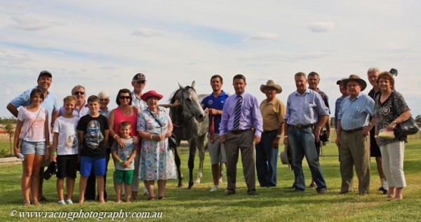Castlereagh Grey with winning owners after her first race start at Warren 14-12-12.Photo : Courtesy of www.racingphotography.com.au